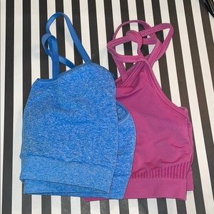 Two sports bras in M. Fabletics/Champion.